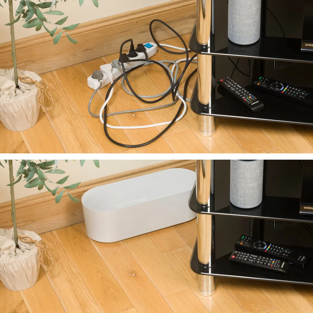 Kabelbox naast een bureau om stekkerdoos en kabels uit het zicht te houden